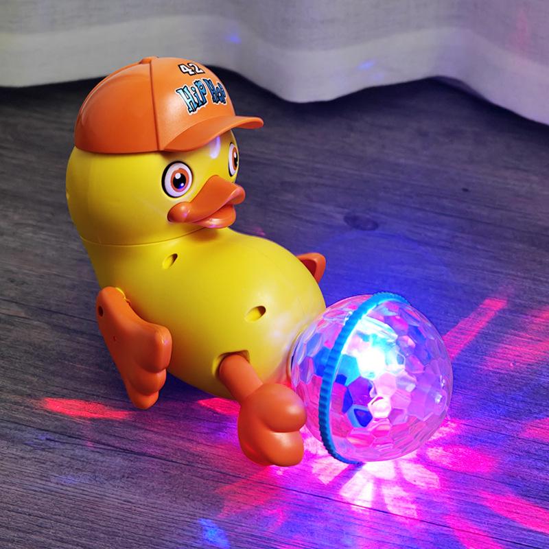 Đồ chơi chú vịt nhảy hip hop xoay 360 độ có đèn có nhạc sử dụng pin Toy Phát Nhạc Loa