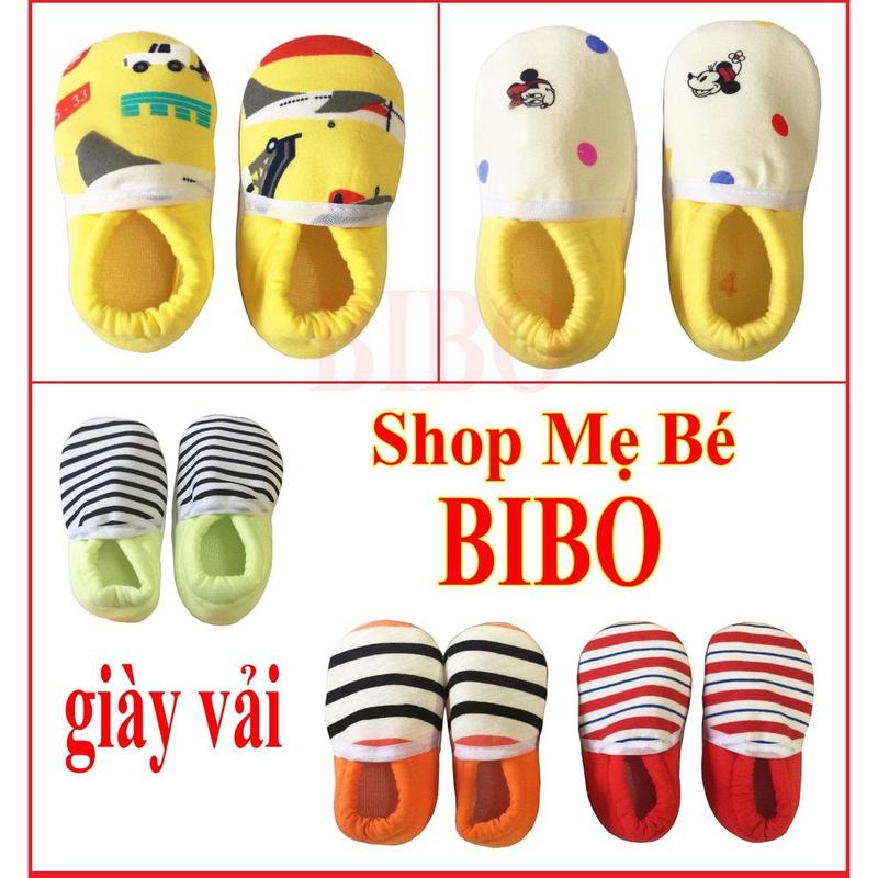 01 Giày  vải mang ấm chân cho các bé sơ sinh , bảo vệ chân mang tập đi