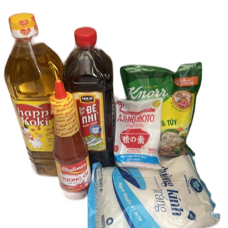 Combo 6 món gia vị  thiết yếu gia đình hàng ngày gồm 1 chai dầu ăn happy 1 chai nước mắm đệ nhị , 1 bịch bột ngọt  , 1 bịch hạt nêm  , 1 bịch  đường trắng  , 1 chai tương ớt .