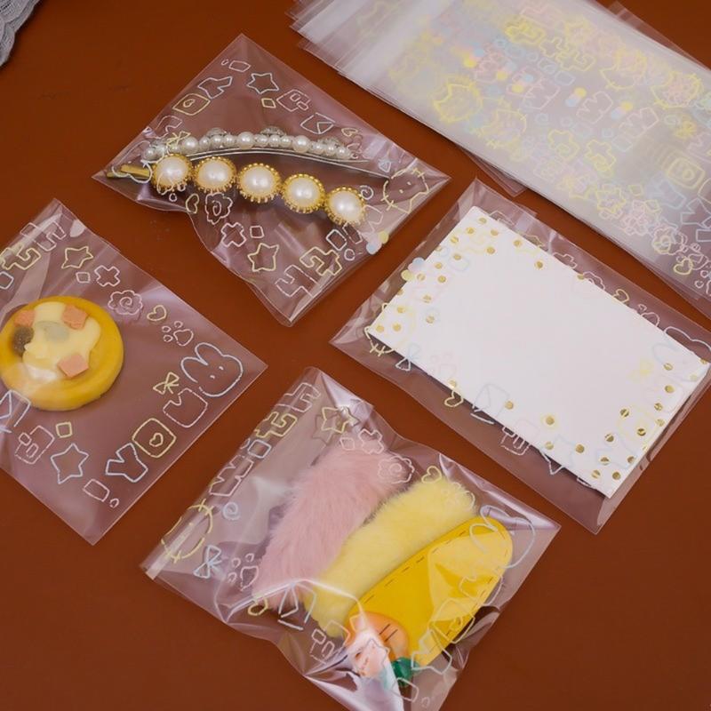 Product Introduction of Túi Niêm Phong Tự Mèo Opp, 50 Cái, Túi Đựng Đồ, Thiết Kế Hoạt Hình Dễ Thương, Trong Suốt, Có Thể Tái Sử Dụng, Chống Bụi, Thích Hợp Cho Kẹo, Người Hâm Mộ Ảnh, Bảo Vệ Nắp Chụp, Trưng Bày Trang Sức Và Đóng Gói 19