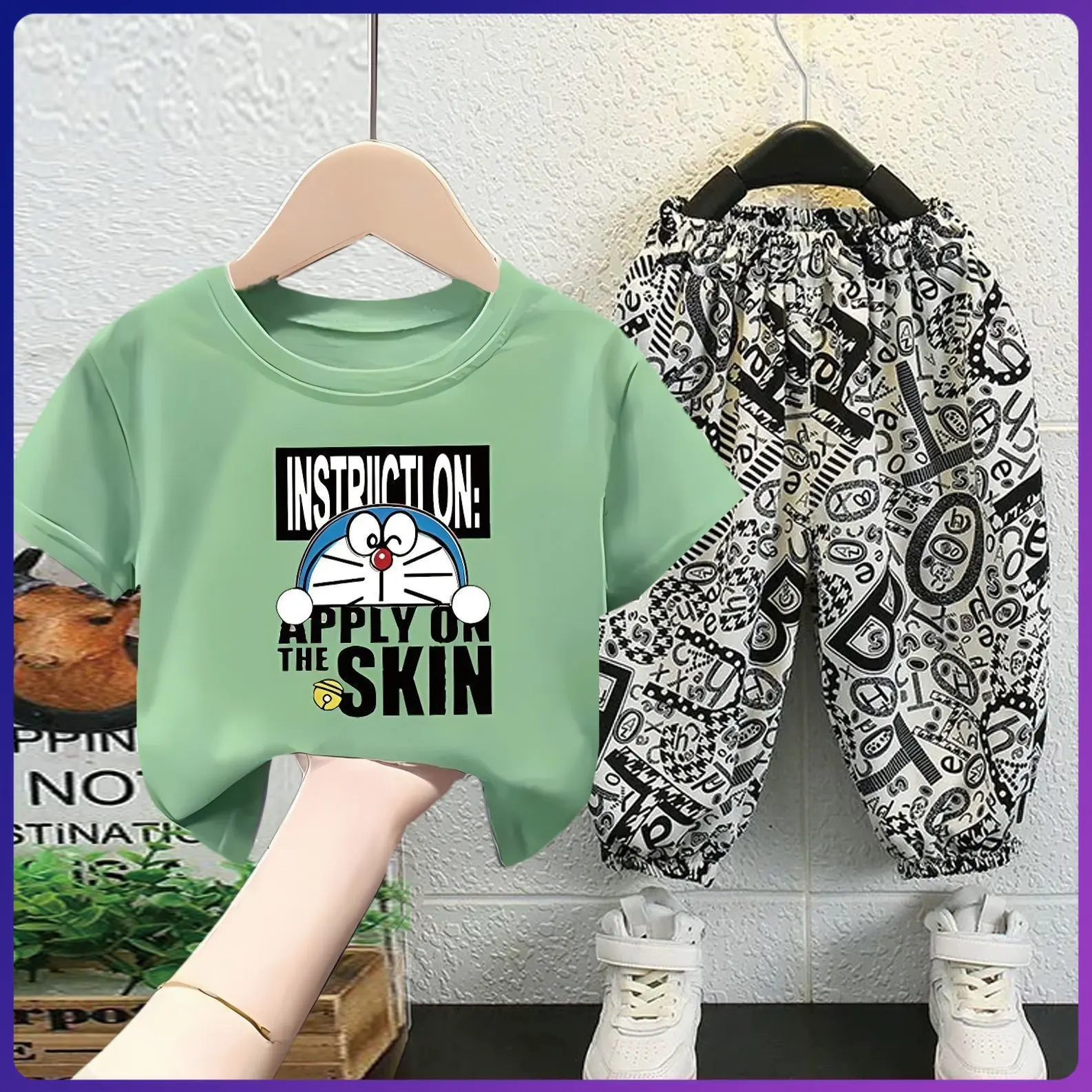【ออกจากคลังสินค้าในวันที่สั่งซื้อในตอนเช้า】เสื้อผ้าเด็กสไตล์เกาหลีชุดสองชิ้นสำหรับเด็กผู้ชายและเด็กผู้หญิงชุดฤดูร้อนแบบใหม่เสื้อยืดผ้าฝ้ายสีขาวสไตล์ตะวันตกสำหรับเด็กเสื้อยืดกางเกงลำลอง
