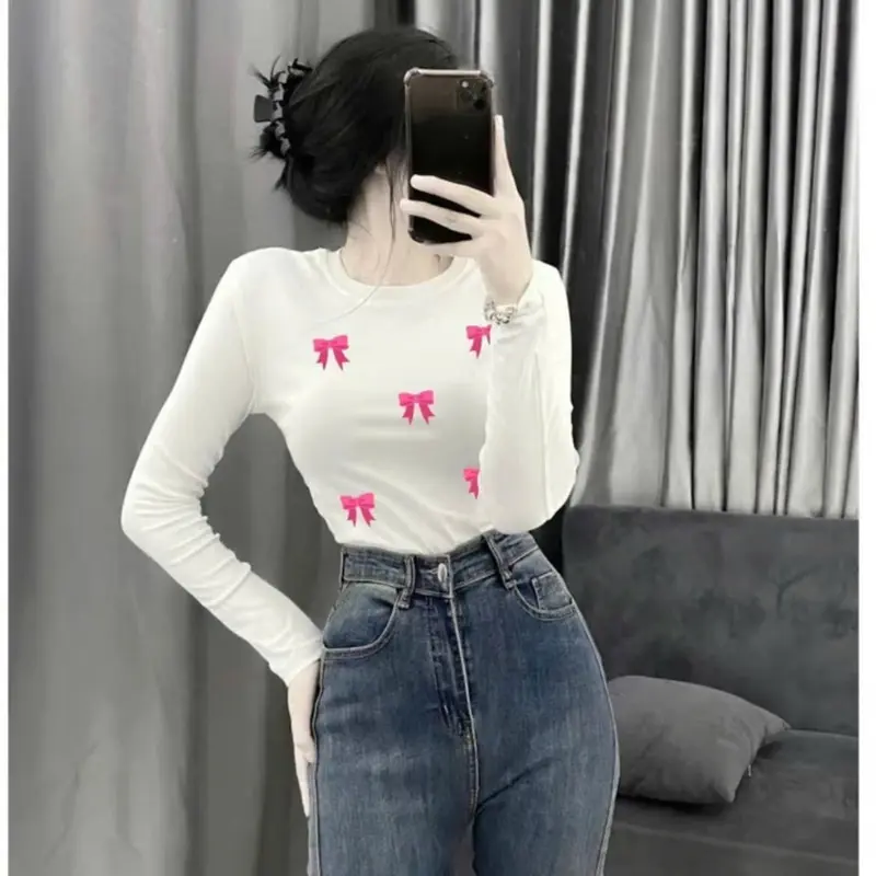 ÁO THUN TĂM TAY DÀI IN 5 cái nơ màu hồng xinh 2