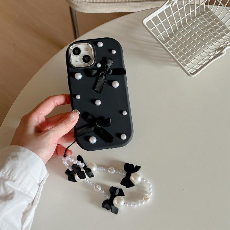 Product Introduction of Bowknot Decor Phone Case with Faux Pearl Beaded Lanyard, Cute Fashion Phone Protective Case, Full Coverage Shockproof Phone Cover Compatible with iPhone 15 14 13 ProMax 13
