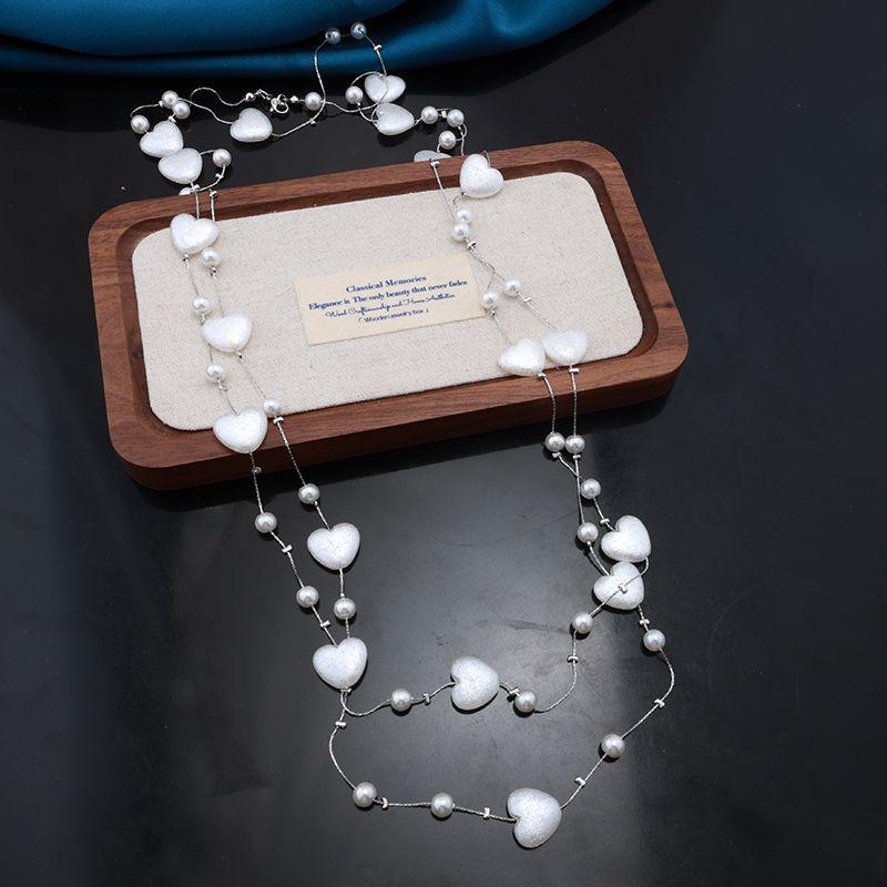 Product Introduction of Long Popular Pearl Fashion High Sense Necklace New Autumn and Winter Wild Sweater Chain Multi-Layer Accessories Ornament Lanyard 6