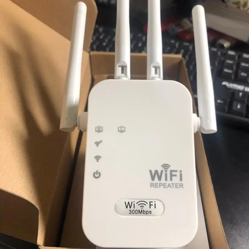 Bộ mở rộng sóng wifi 4 râu tốc độ 300mbps phù hợp với gia đình và văn phòng máy tính ti vi camera - Chuẩn N - Phát xuyên tường - Có 2 cổng LAN 2
