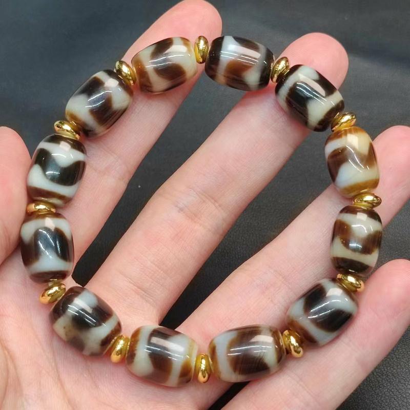 Product Introduction of Natural Gemstone Tiger Tooth Pattern Panda Mandala Three-Eyed Agate Dzi Bead Multi-Treasure Bracelet Tooth Yellow White Core Barrel Bead Unisex Ethnic Style 1