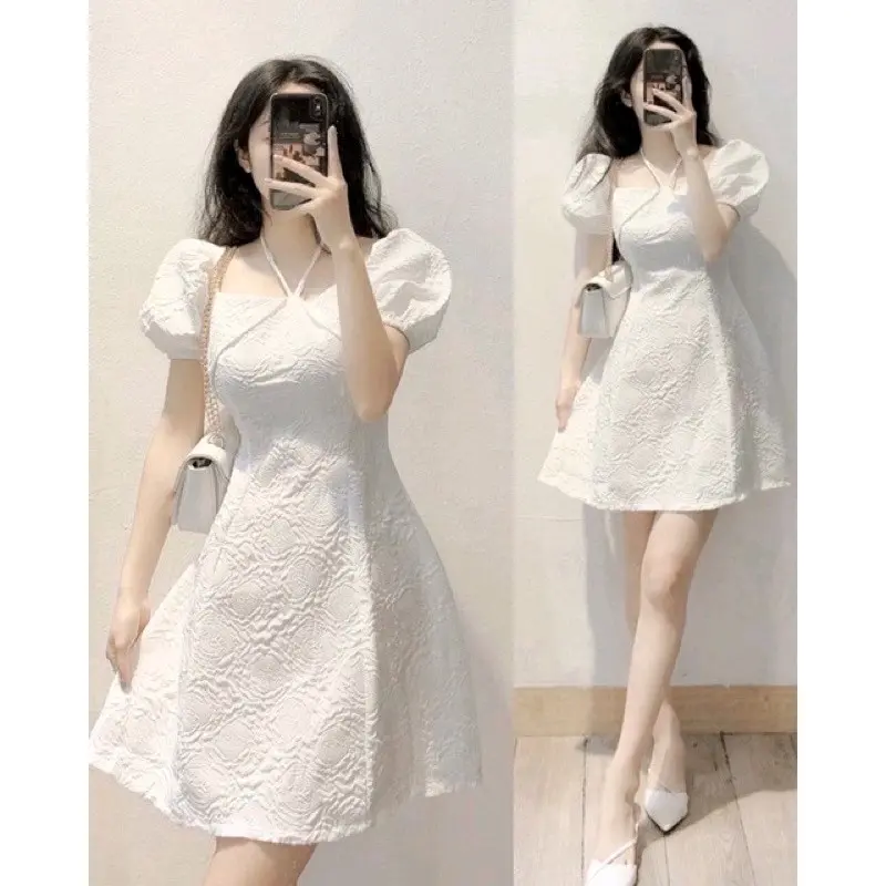 Đầm cổ yếm chất xốp in hoa nổi