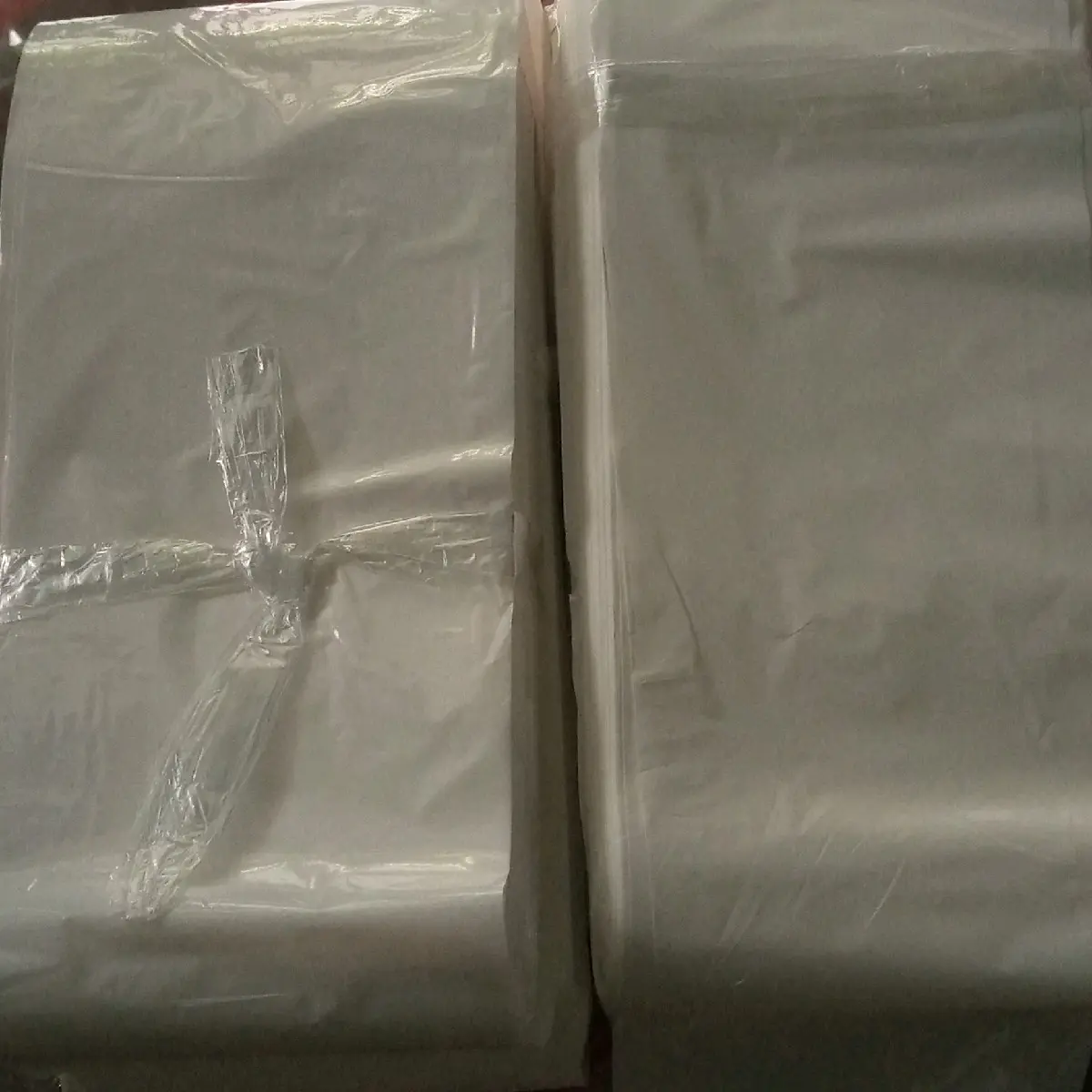 plastik roll dop tebal 04. (11x04x260m_putih susu)