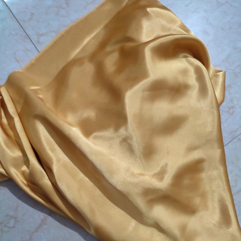 Vải quần lụa bóng phước thịnh màu vàng đồng 0