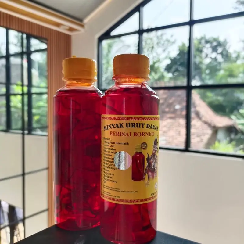 MINYAK URUT DAYAK KALIMANTAN IBU IDA 250 ML Minyak Pijat gosok 7