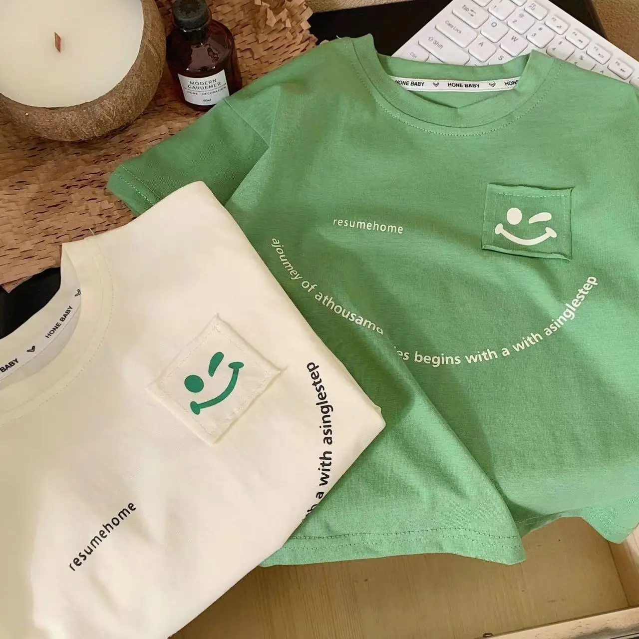 Summer new children's short sleeved T-shirt boys Korean version smiling face loose half sleeved baby top for children