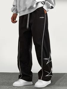 Pantalones para hombre con parche de letras, franja lateral y cintura con cordón, pantalones casuales holgados con bolsillos, corte cómodo, moda para todas las estaciones, pantalones largos holgados para hombre