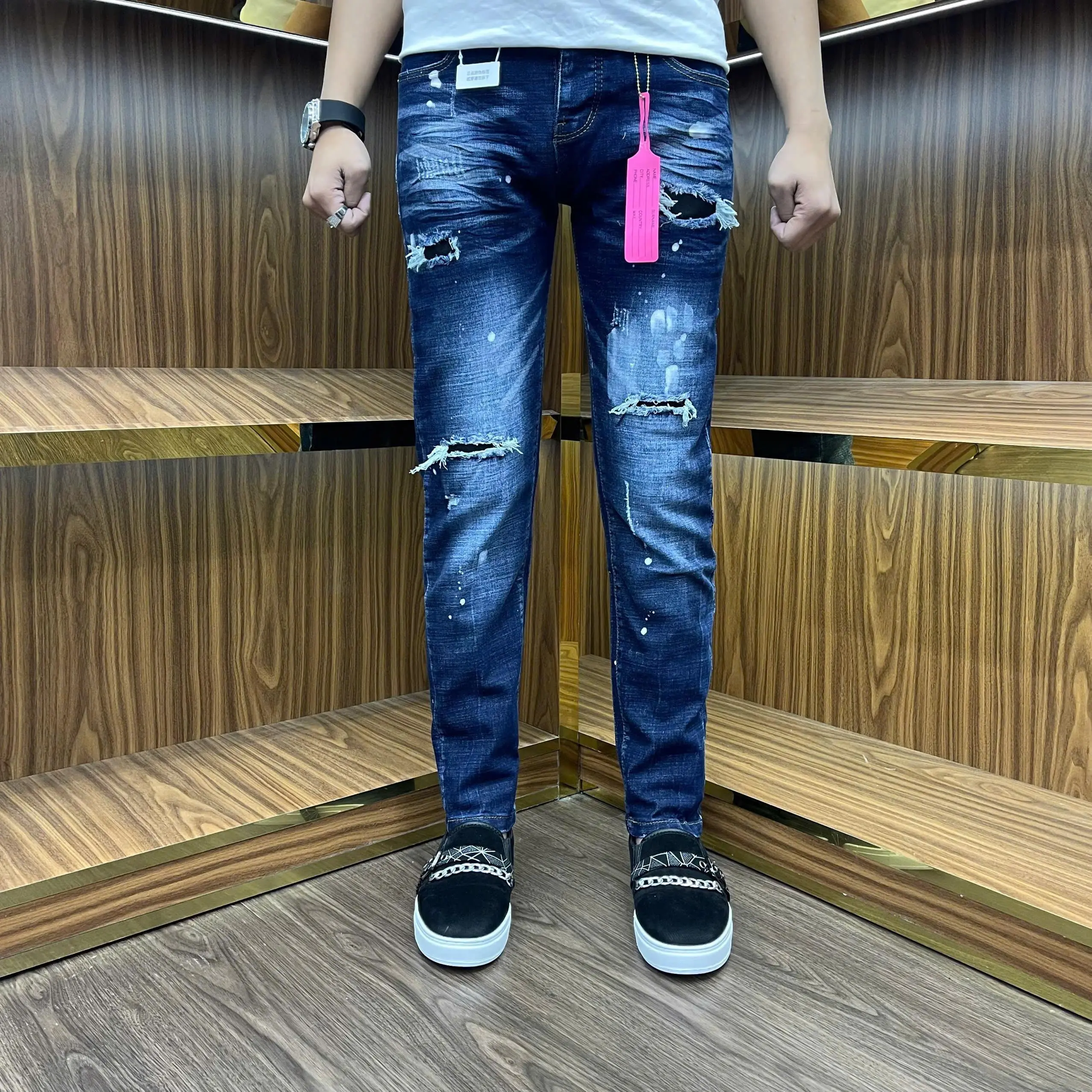 Quần jeans nam xanh vảy sơn rách 4 lỗ bốn cúc