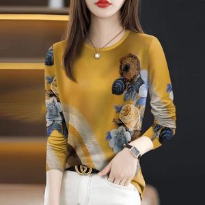 เสื้อยืดผู้หญิง แฟชั่นสไตล์ฤดูใบไม้ผลิและฤดูใบไม้ร่วงใหม่ อเนกประสงค์ สลิมมิ่ง ซ่อนท้อง คอกลม แฟชั่น แขนยาว ปี 2025