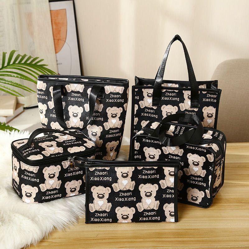Product Introduction of New Cosmetic Bag Portable Large Capacity Waterproof Cosmetics Storage Bag Travel Handbag Cartoon Wash Bag 3