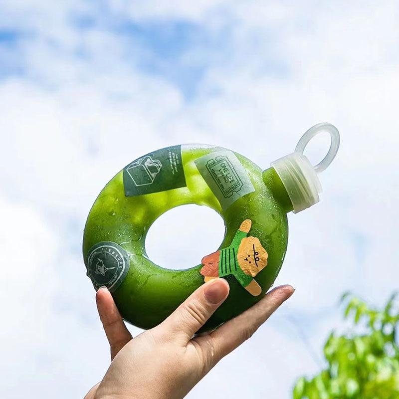 Product Introduction of 1Pcs Wholesale 500ML Donuts Water Bottle for Kids Cartoon Silicone Portable Travel Round Cup Portable Anti Fall Plastic Cup Kids Gift 1