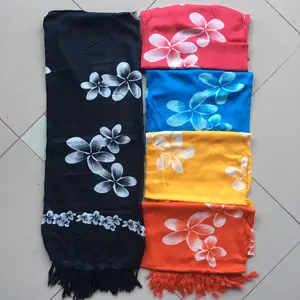 Pakaian wanita sarung kamen kain pantai motif bunga jepun putih kamboja oleh-oleh souvenir khas bali
