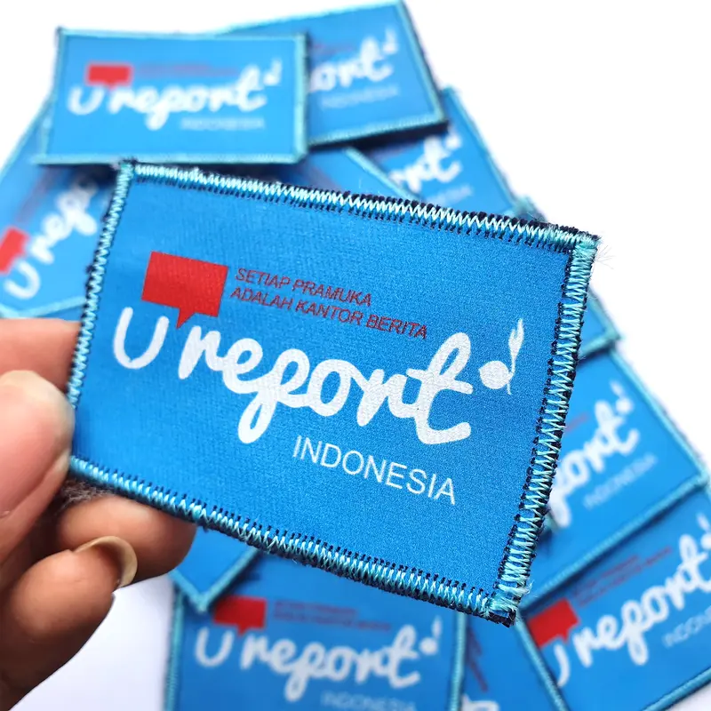 Tiska U Report Pramuka DTF lis bordir Ureport 2