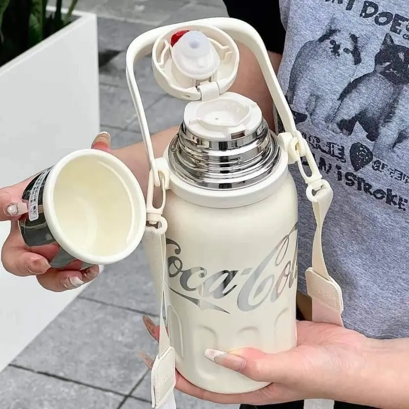 BìnH  giữ nhiệt inox 316 co/ca 1200ml chịu được nóng lạnh tặng kèm quai xách và dây đeo vai tiện lợi mang đi học đi chơi đi làm 3