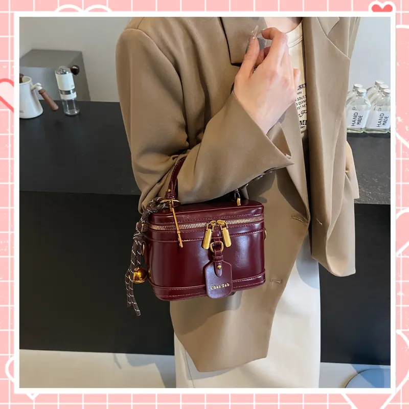 Túi xách nữ đeo chéo túi cốp nữ da trơn kèm chuông thời trang sang chảnh K254 Bag Nhung 3