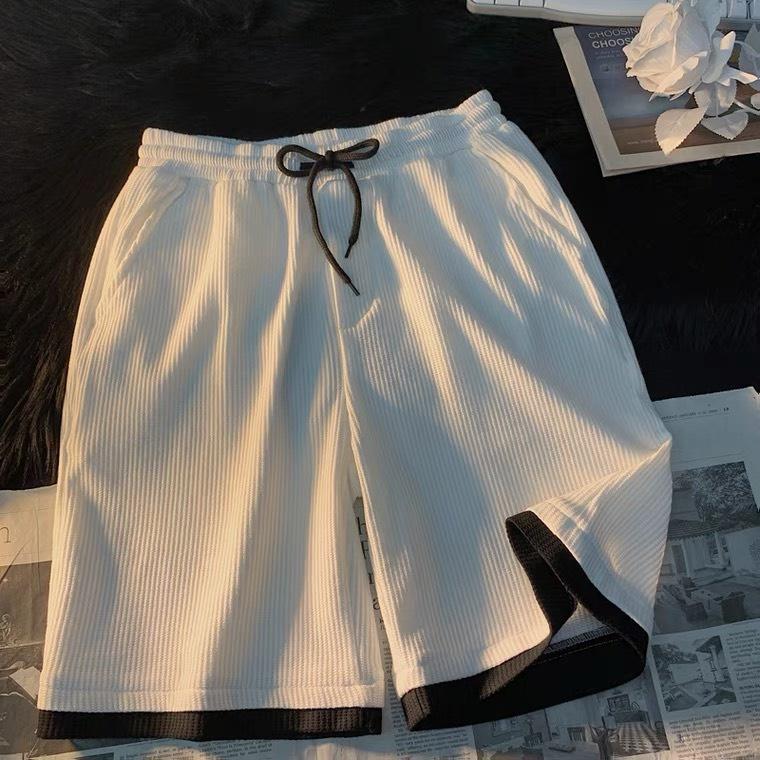 Quần đùi nam nữ có phối LAYER là điềm nhấn chất tổ ong thoáng mát Menswear Ô 1