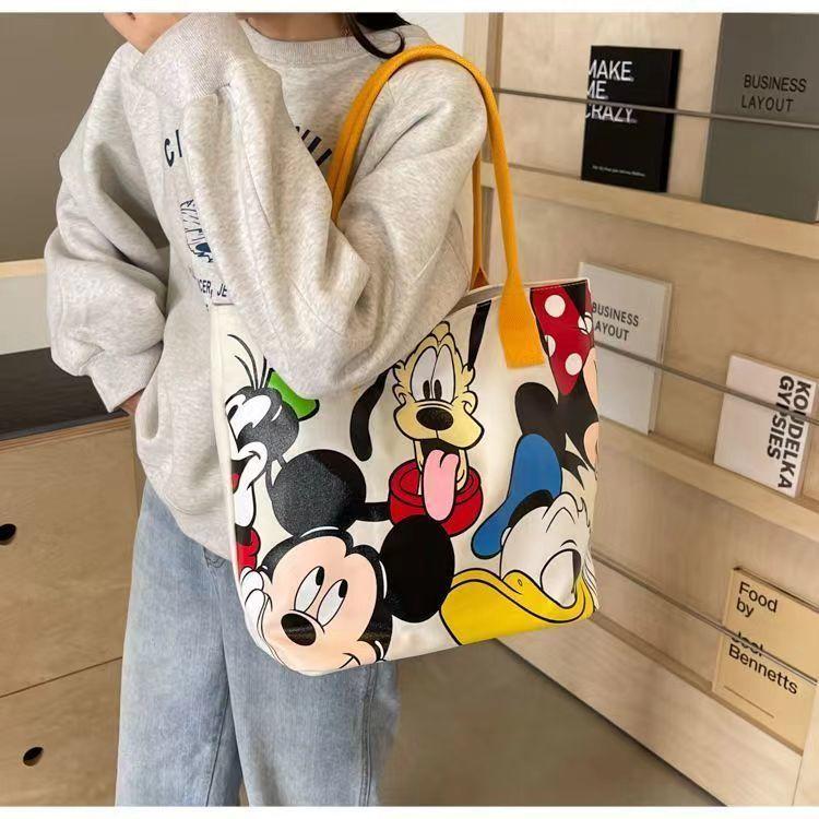 Product Introduction of New Mickey canvas bag schoolgirl large capacity cute cartoon goofy dog tote bag shoulder tote bag 21