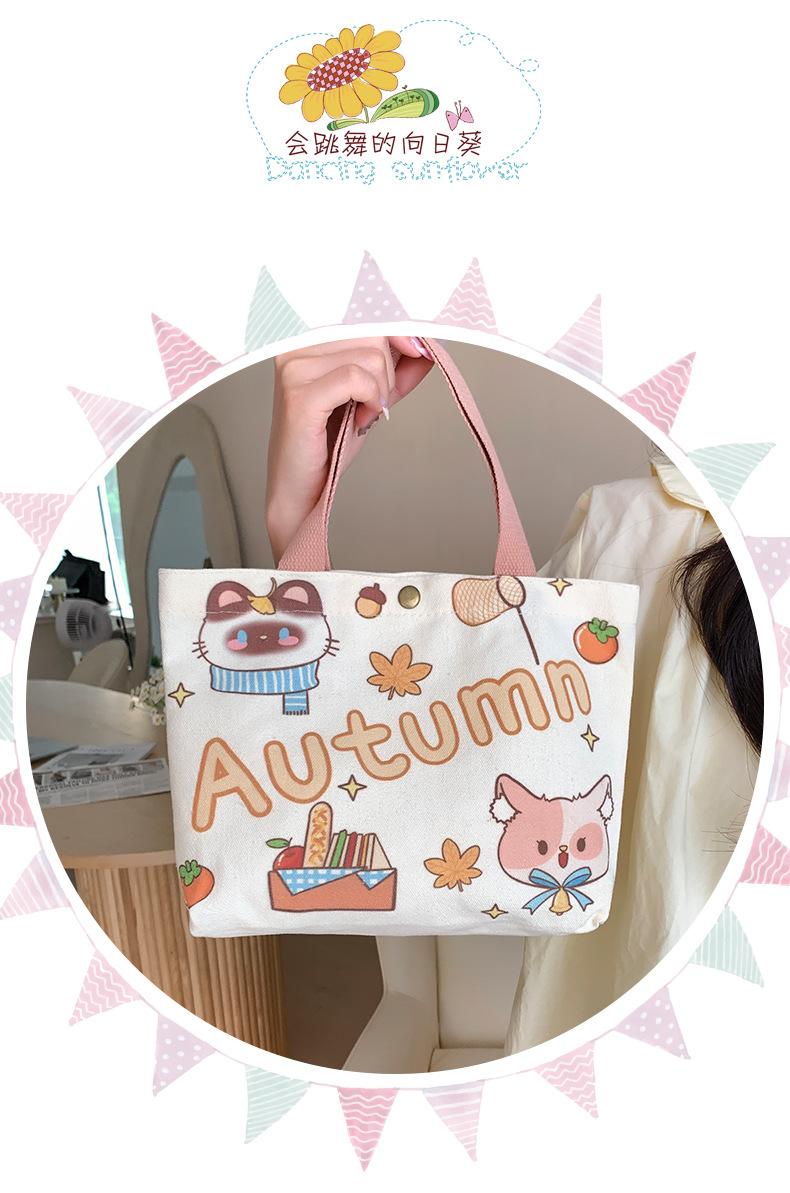 Product Introduction of Túi Vải Bố, Dành Cho Nữ, Thiết Kế Hoạt Hình Chính Hãng Túi Tote Mini, Thích Hợp Cho Nhân Viên Văn Phòng, Túi Xách Nhỏ Túi Đựng Hộp Cơm Trưa, Hàng Mới Về 2025, Bán Buôn Có Sẵn 7