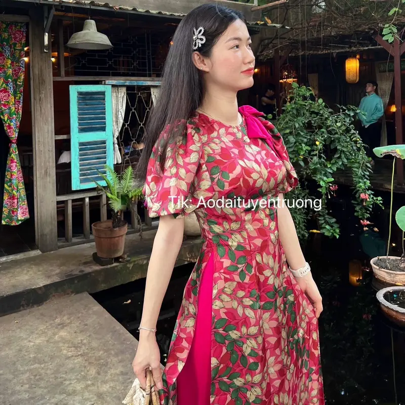 Bộ áo dài hoa lá đính nơ 2 màu 3