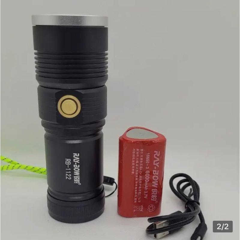 Đèn pin cầm tay siêu sáng RAY BOW 1122 chiếu xa 700 m có ZOOM xa gần chống nước sạc ngược cho điện thoại