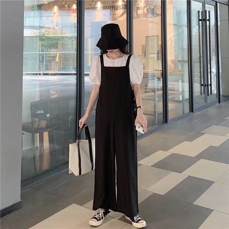 NAURA JUMPSUIT POLOS 1