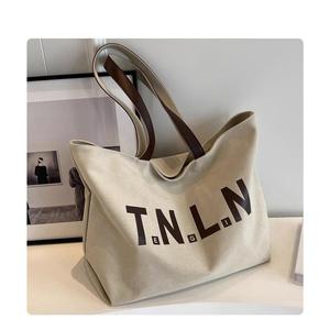 กระเป๋าผ้าใบขนาดใหญ่สำหรับผู้หญิงรุ่นใหม่ กระเป๋าสะพายข้างสบายๆ เหมาะกับทุกโอกาส กระเป๋าโททอล สำหรับนักศึกษาและใช้ในการเดินทางไปทำงาน