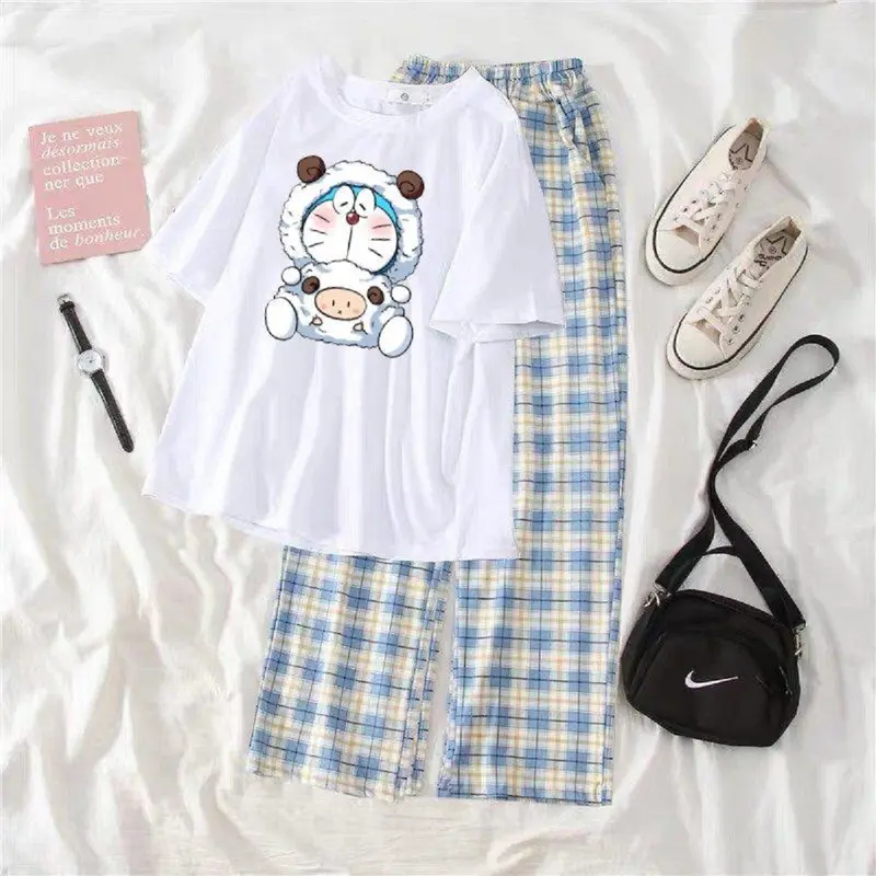 Bộ Áo Thun Nam Nữ Cổ Tròn In Hình Dora và Quần Kẻ Karo Ống Rộng Vải Thun Top 2