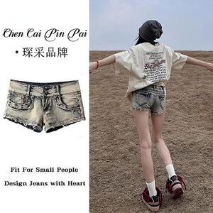 กางเกงขาสั้นขาดเดนิม สไตล์อเมริกันเรโทร สำหรับผู้หญิง เอวต่ำ ทรงสลิมฟิต บอดี้คอนเล็ก กางเกงสุดฮอต เปิดตัวในปี 2568 เหมาะสำหรับฤดูร้อน