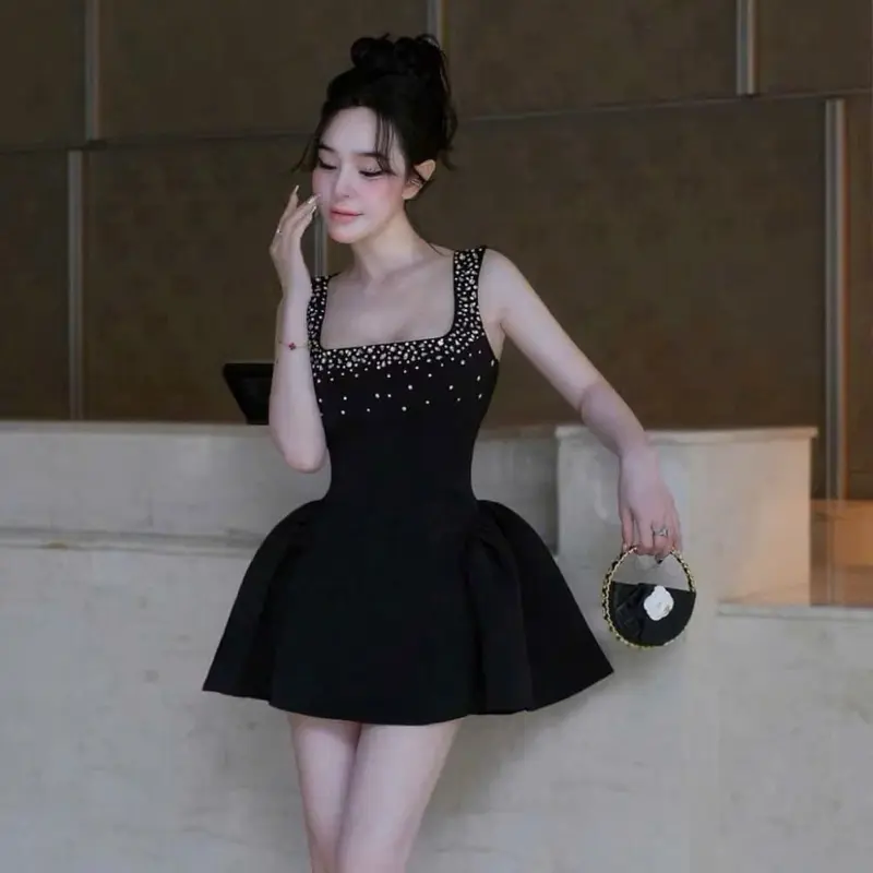 ĐẦM THIẾT KẾ KHÂU ĐÁ VÀ HẠT PHA LÊ SIÊU SANG