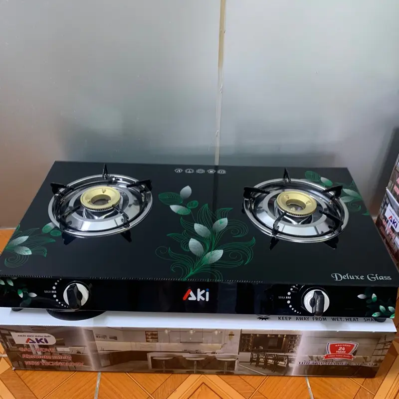 Bếp ga đôi AKI mặt kính, mâm mon họng inox