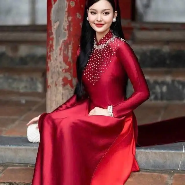 Áo dài mẹ đính kết với chất liệu lụa ruby sang, đẹp cho mẹ diện sui gia đám cưới đám hỏi