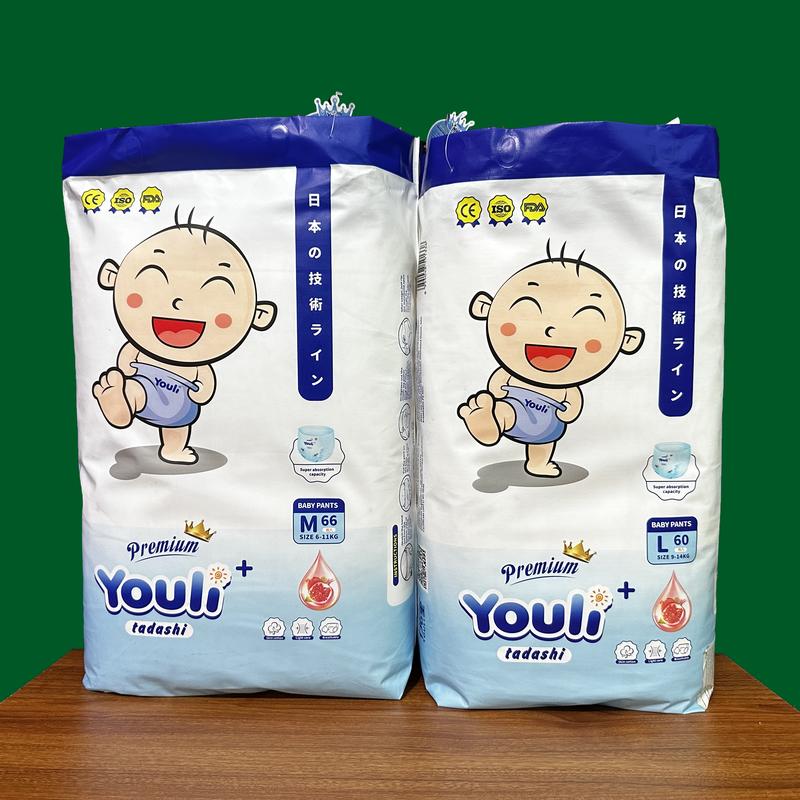 [không quà]Tã Bỉm Youli Tý Quậy 2 Bịch, Công Nghệ Hạt Sap Và Mặt Bông Cho Bé, Mỏng, Mềm, Thoáng Mát, Thấm Hút Tốt,Size Dán M66 Quần M66/L60/XL54/XXL50/3XL46 Nữ