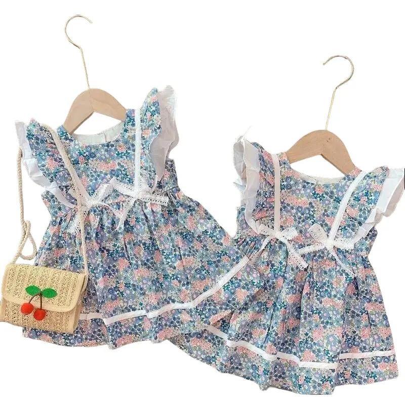 Váy bé gái cánh tiên hoa xanh cực xinh cho bé