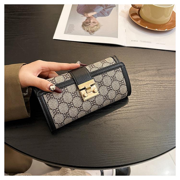 Product Introduction of Ladies' Short, High Appearance, Multi Slot, Three Fold Buckle, Hand-held Long Wallet 9