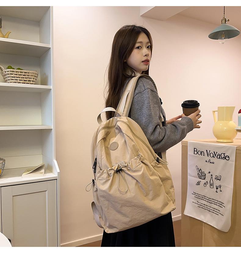 Product Introduction of Backpack, Student Schoolbag, Outdoor Backpack Leisure Simple and Lightweight Early High School Student Schoolbag New Drawstring All-Match Travel Backpack 2