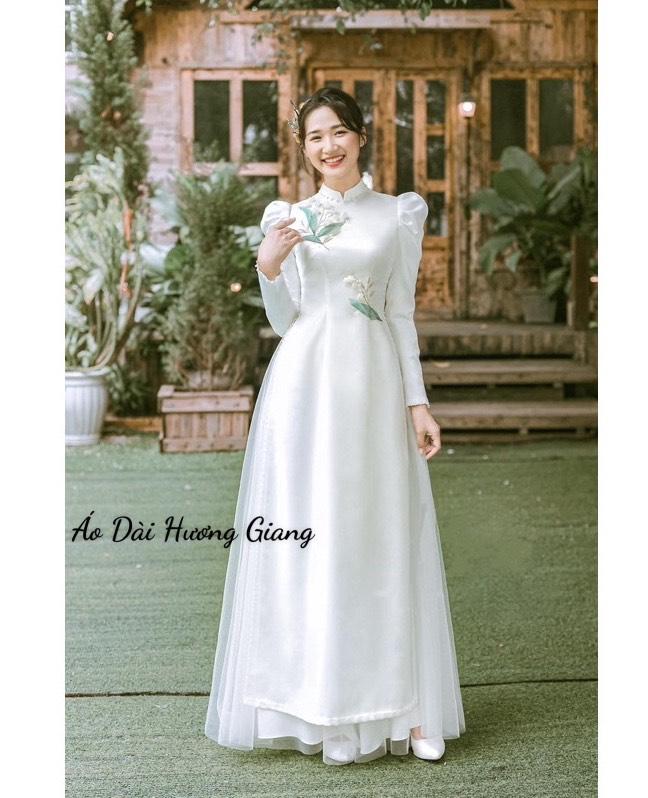  Áo dài thiết kết màu trắng tay bồng trẻ trung hoa đính kết thủ công - Áo Dài Hương Giang Nữ Kem Women Dress Sen 
