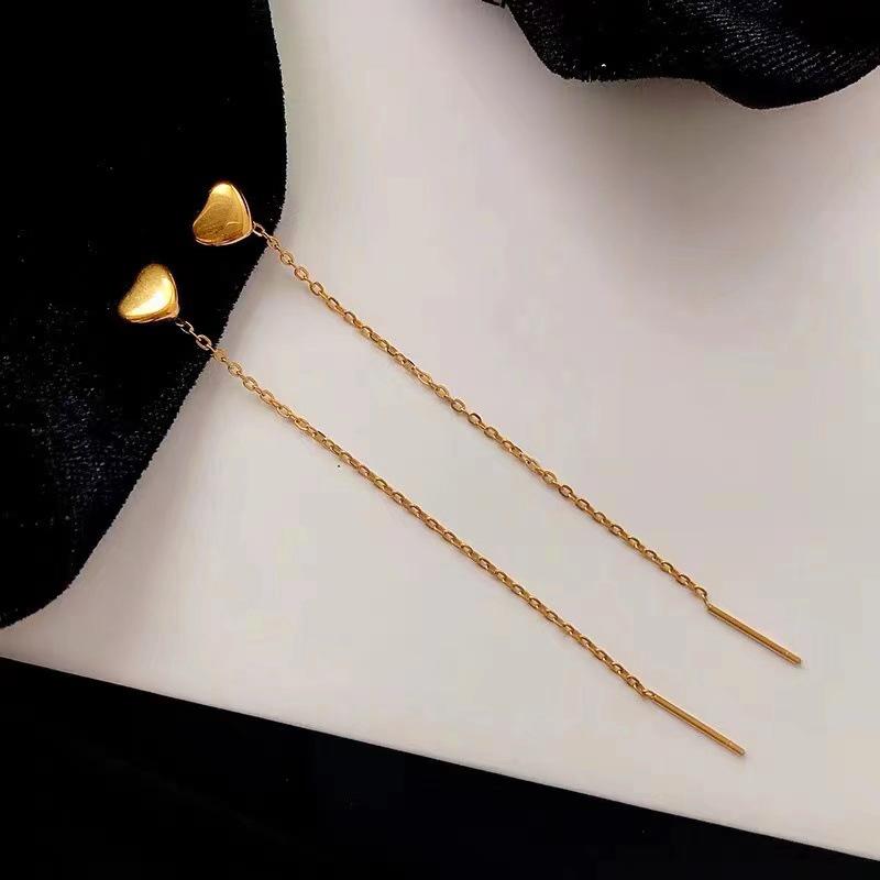 Product Introduction of Titanium steel color preserving solid heart-shaped lines with tassels, peach hearts wrapped in gold, heart-shaped long ear lines, ins, slimming ear chains that highlight the face 1