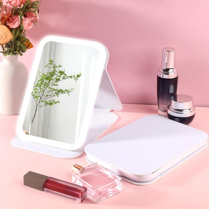Product Introduction of LED makeup mirror with lamp PU mirror portable folding fill light mirror portable beauty mirror iconic  selfie  mirror  chapel  light 4
