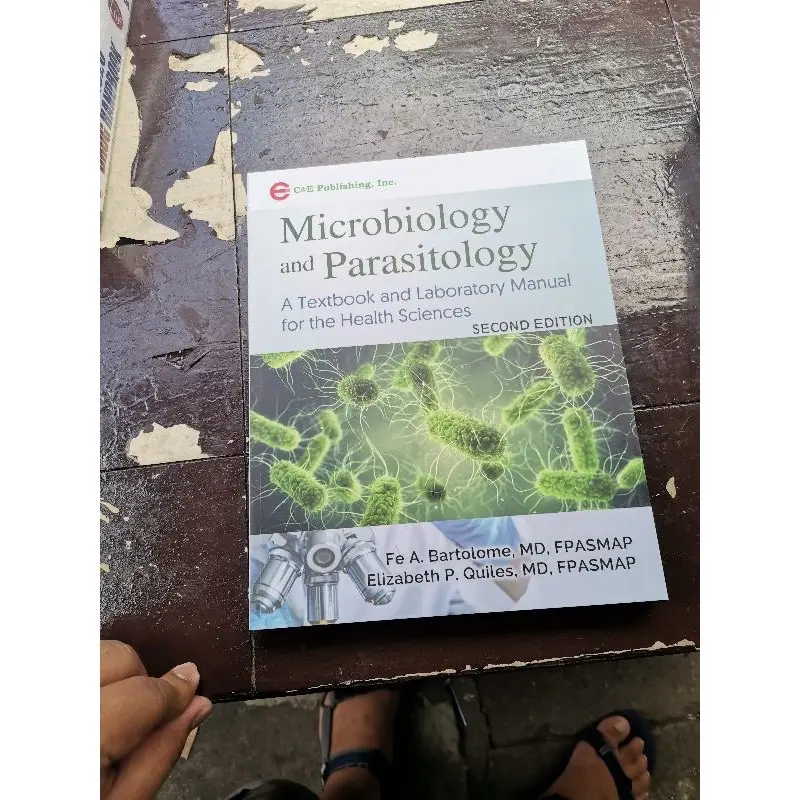 (Micropara)Microbiology and Parasitology A Textbook and Laboratory Manual for the Health Sciences SECOND EDITION By. Fe A. Bartolome, MD, FPASMAP Elizabeth P. Quiles, MD, FPASMAP Soft Cover Regular Edition