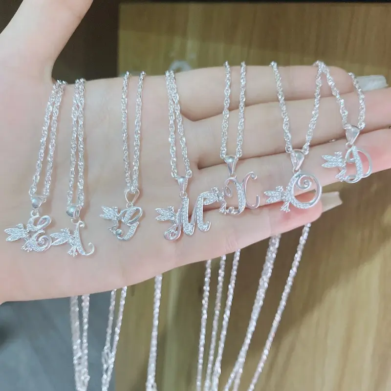 Dây chuyền chữ cái cánh thiên thần bạc ta MAINOMI 0