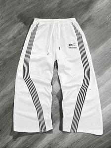 Pantalones deportivos para hombre con franja lateral y cintura con cordón, corte regular casual con bolsillos y pierna recta para otoño e invierno, pantalones para uso diario