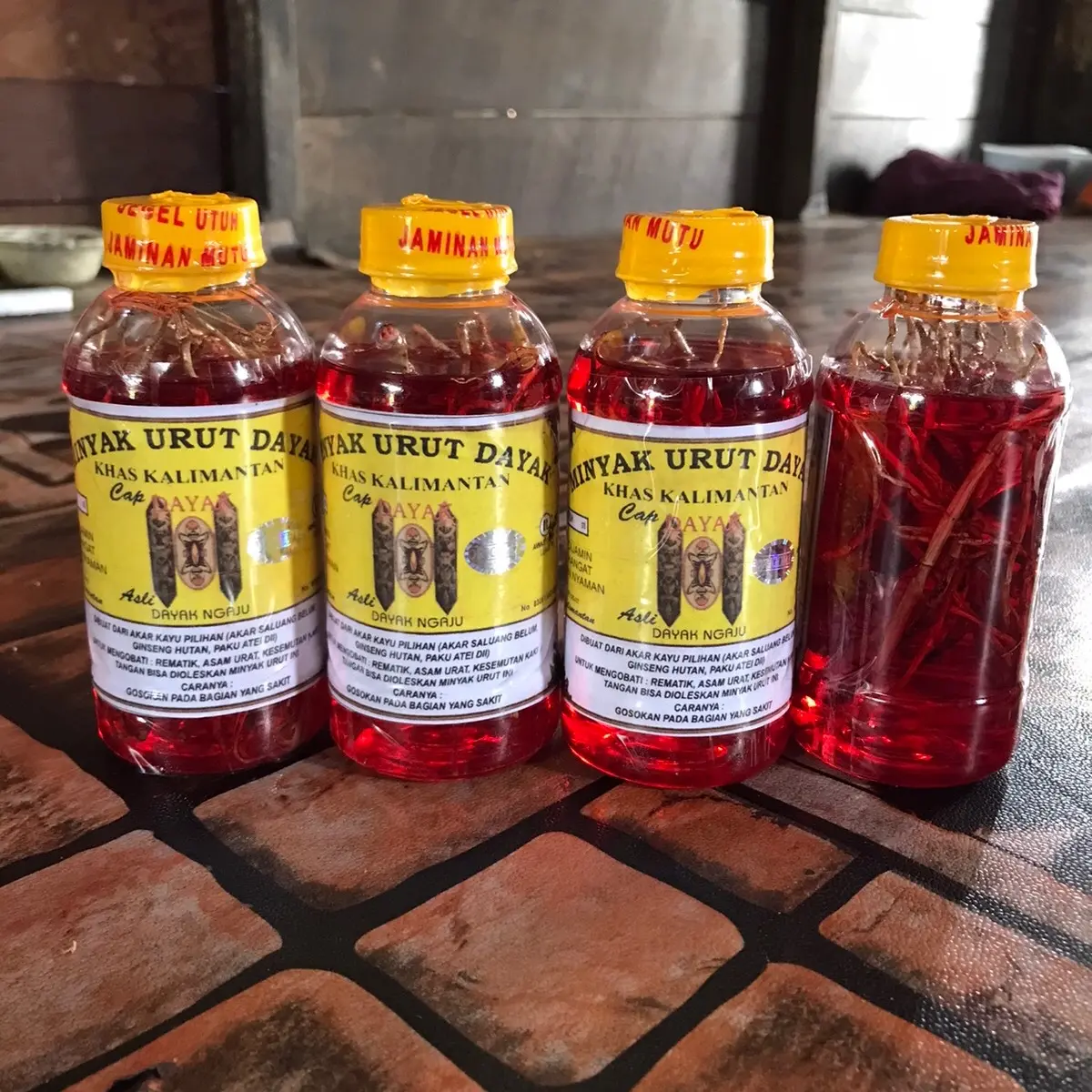 Paket hemat Minyak urut dayak 4 botol isi 200ml
