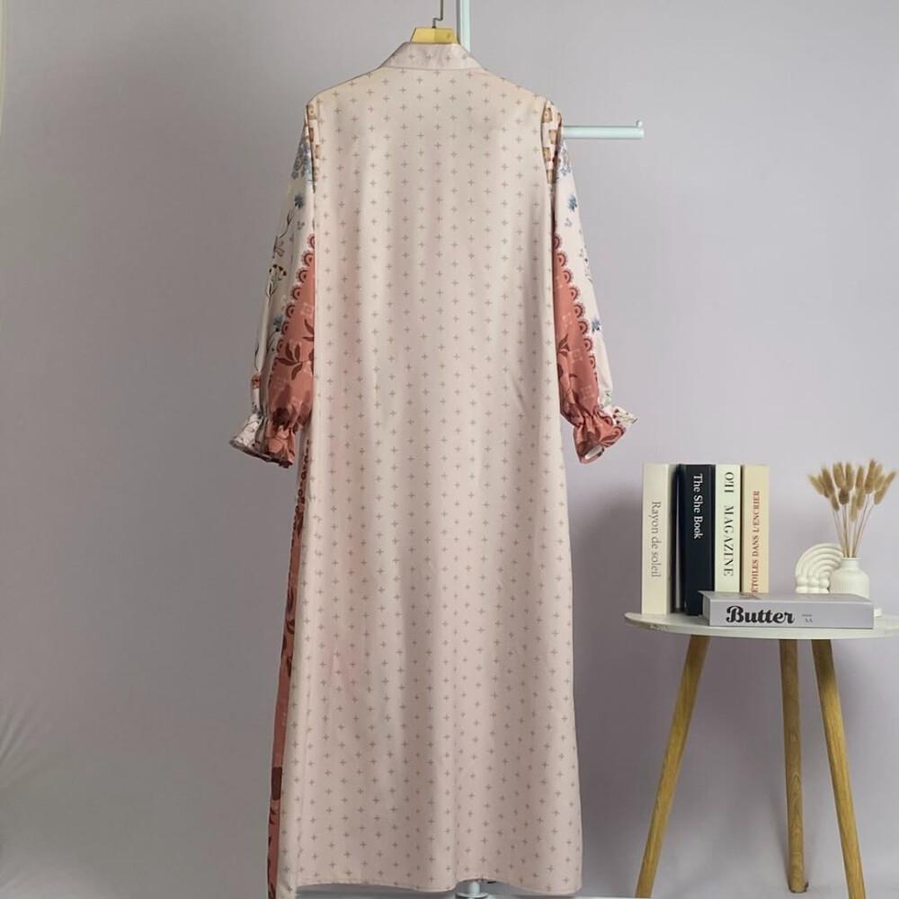 Asaya Gaun elegan dengan motif posisi mode lengan panjang