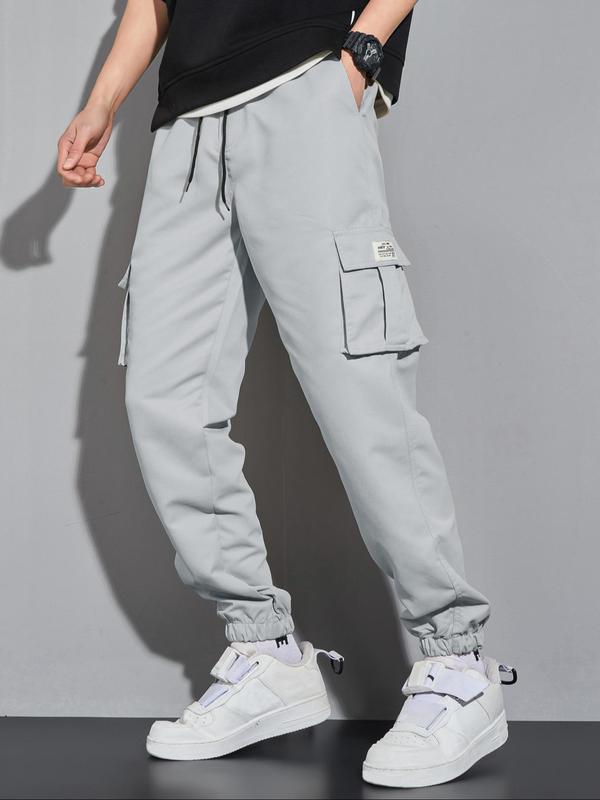 Men's Letter Patched Pocket Cargo Pants, Stylish Loose Drawstring Trousers, Drippy Outfits, Going Out Outfit, Menswear Clothing 1