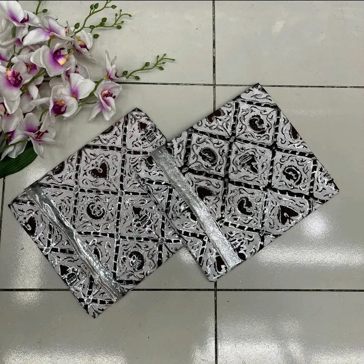 kain pengantin prada